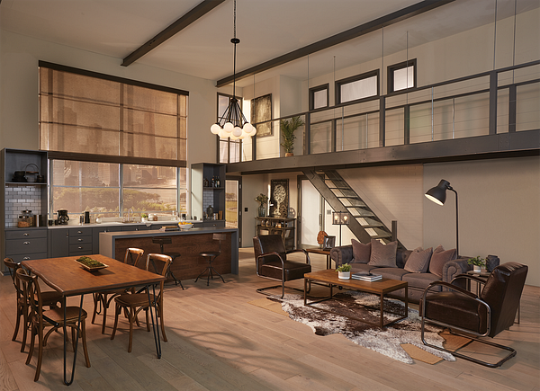 A double-height loft with a woven Roman shade over the kitchen window, pendants and a reading lamp.